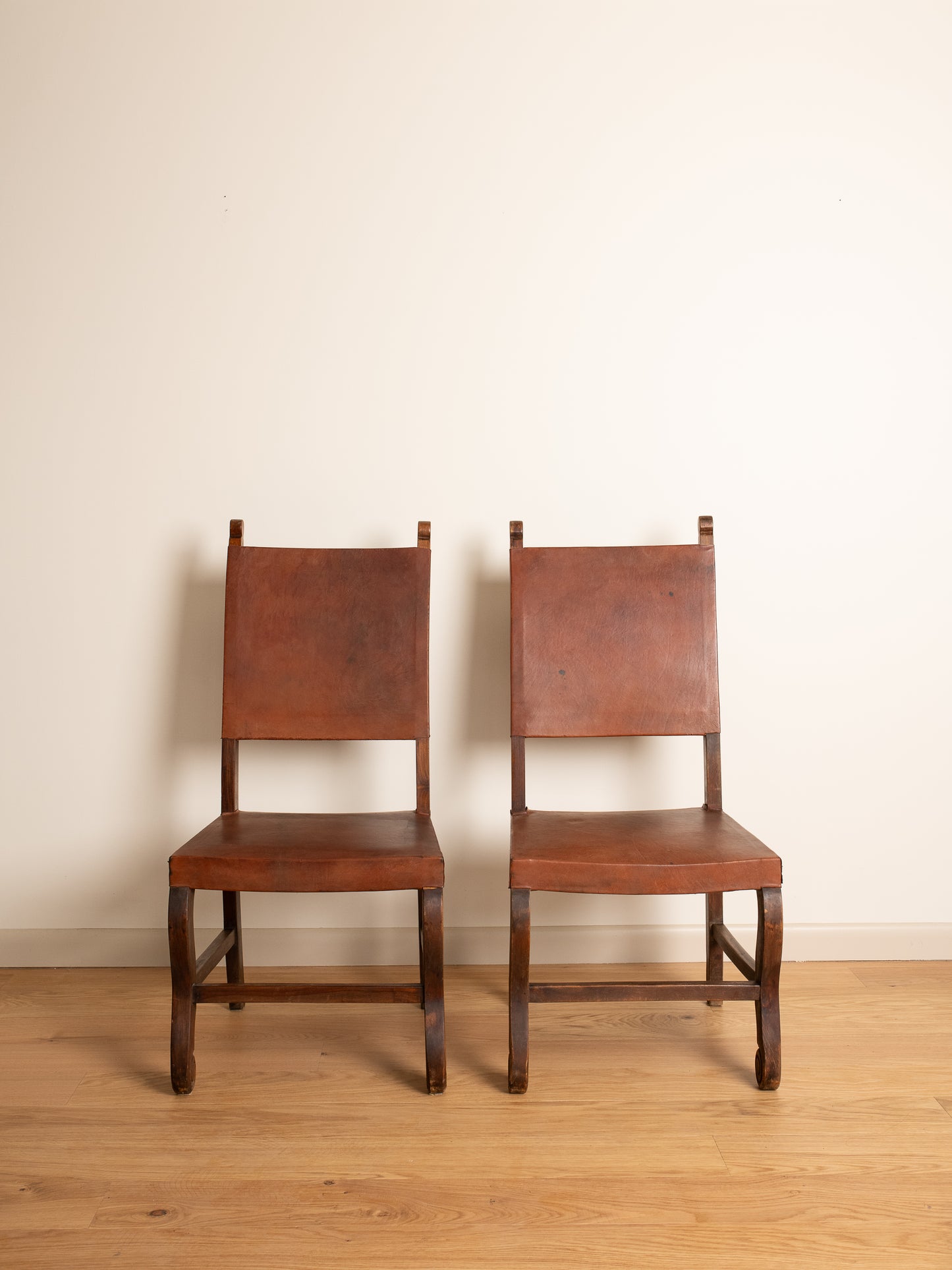 Pair of Antique Leather Side Chairs