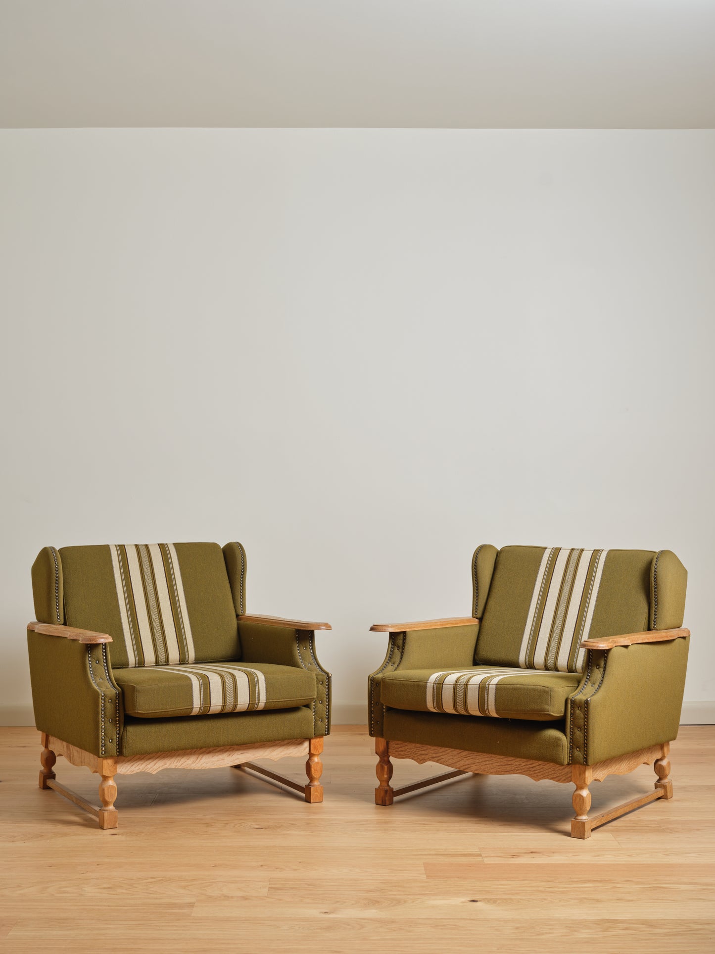 PAIR ATTR. HENNING KJAERNULF OAK LOUNGE CHAIRS